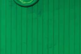 Green painted panel wall