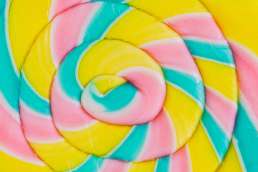 Pink yellow and blue lollipop