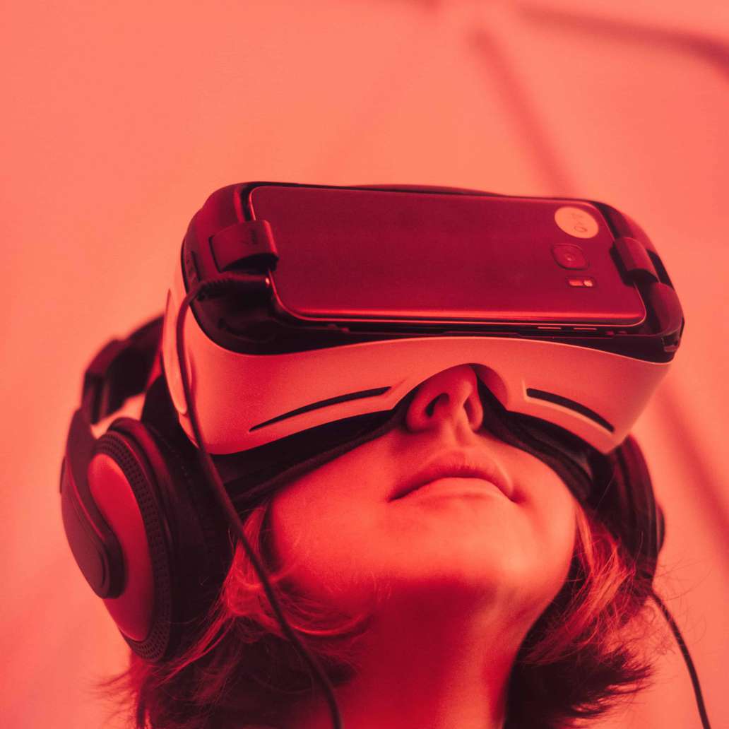 Woman wearing VR headset with red overlay