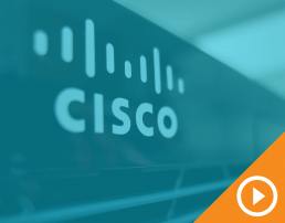 Close-up photo of Cisco logo on one of their products behind a blue transparency with a white play button on an orange triangle in the bottom right corner