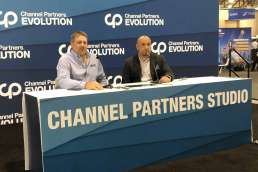 Two men presenting at Channel Partners Evolution studio booth