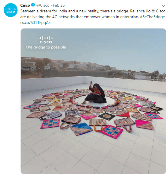 Twitter photo of a woman surrounded by bags
