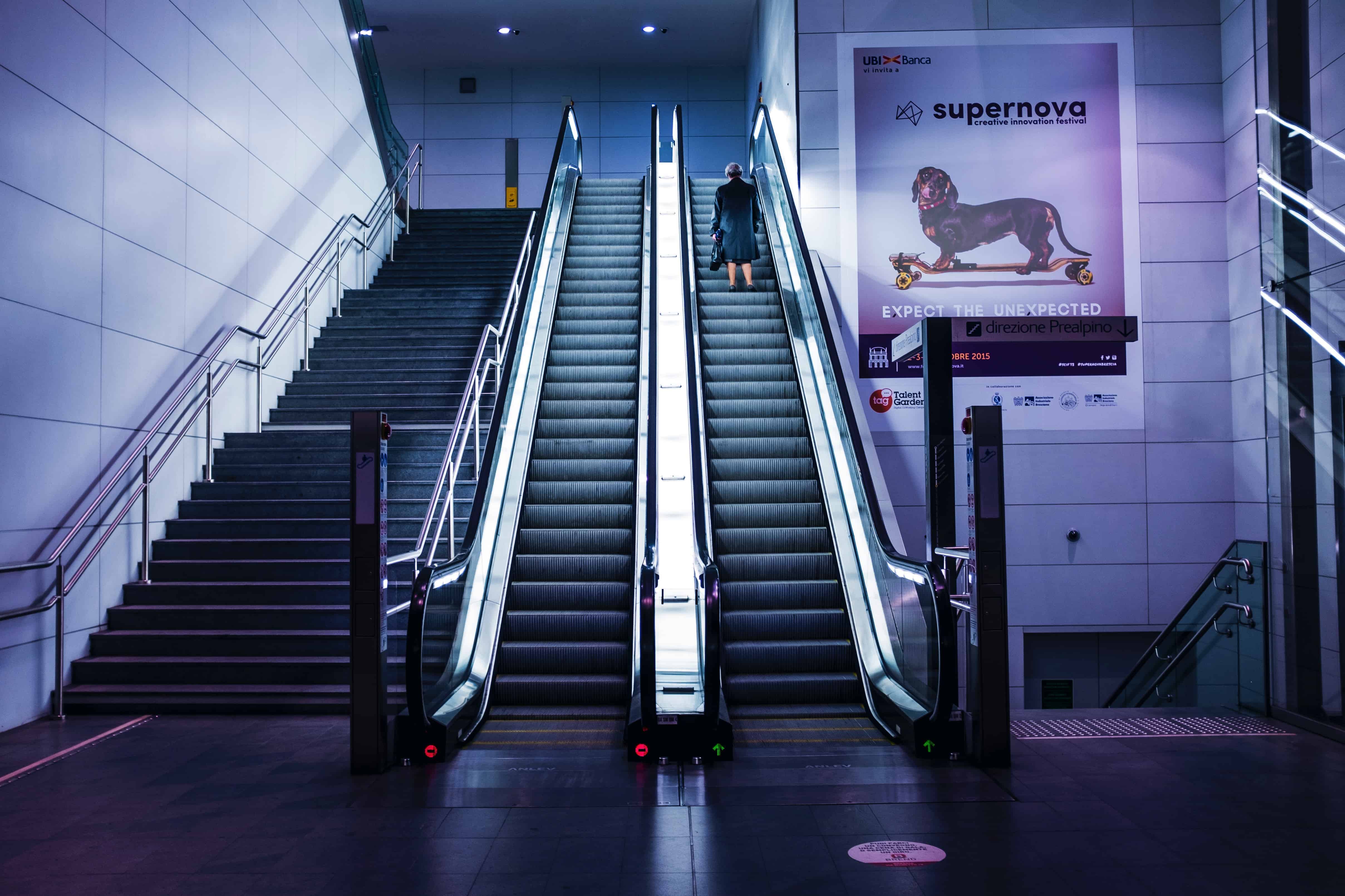 escalator with backlit lighting