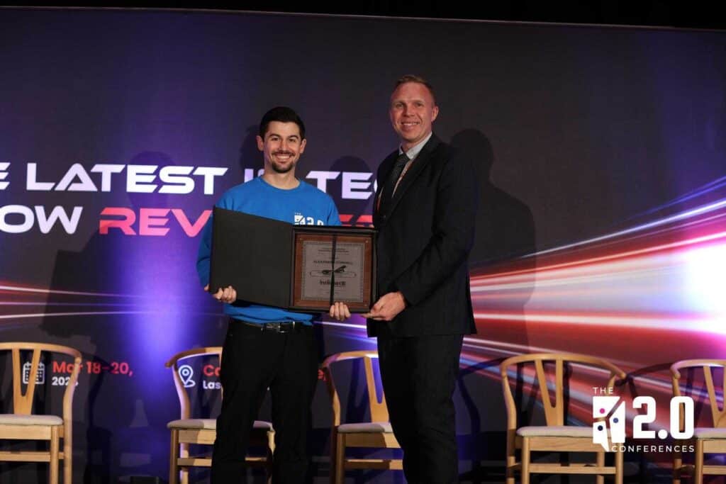 Alex Connell accepts a leadership award at the Internet 2.0 conference